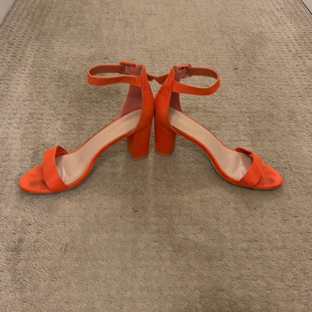 Orange strapped high heels